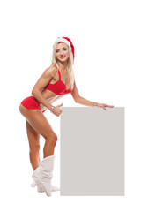 Santa Claus girl near a white board