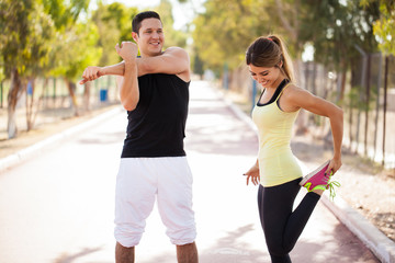 Couple warming up before exercising