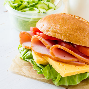 Lunch Box With Sandwich Salad And Friuts