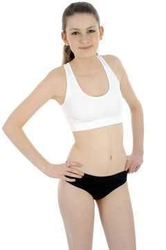 Teen in sports top and competition brief Stock Photo