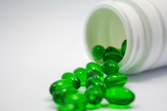 Soft Gel Capsule Vitamins Pills In Green Color