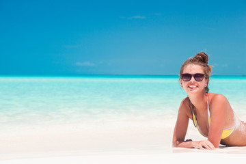 long haired girl in having fun on tropical barbados beach 