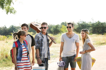 A group of joyful friends having fun outdoors