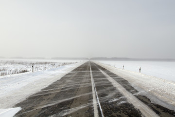 Snowing Road