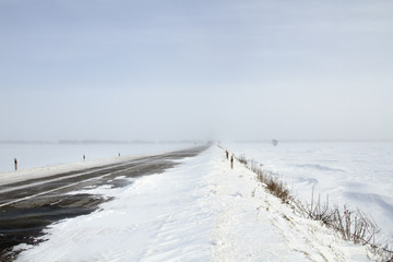Snowing Road