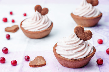 chocolate tartlets with berry cream cheese frosting