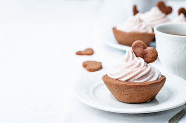chocolate tartlets with berry cream cheese frosting
