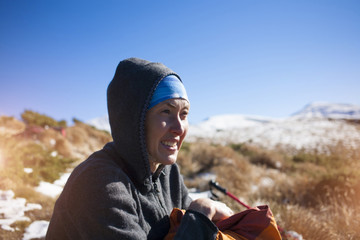 Portrait of a girl on a background of mountains.