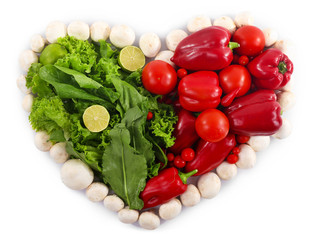 Heart shape vegetable composition isolated on white