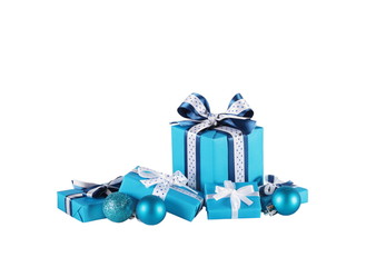 wrapped blue gift boxes and Christmas balls, isolated on white