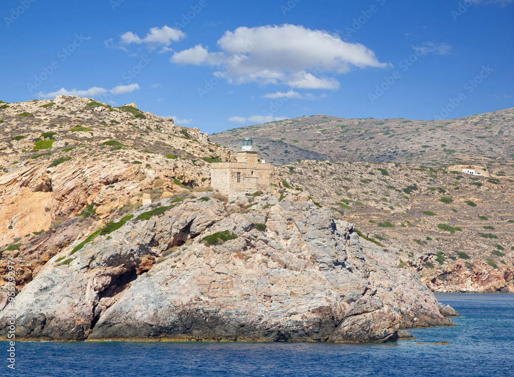 Wall mural the lighthouse of greek island ios in the cyclades group