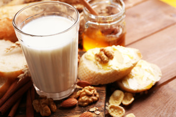 Healthy breakfast with bread, honey, nuts. Country breakfast concept