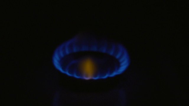 gas. burner gas stove. ignition gas stove burning match. 