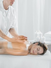 Obraz na płótnie Canvas Woman relaxing during pleasant massage