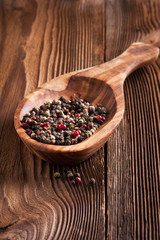 pepper in wooden spoon