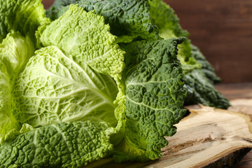 Savoy cabbage on cutting board closeup