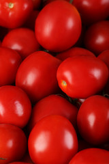 Fresh red tomatoes background, close up