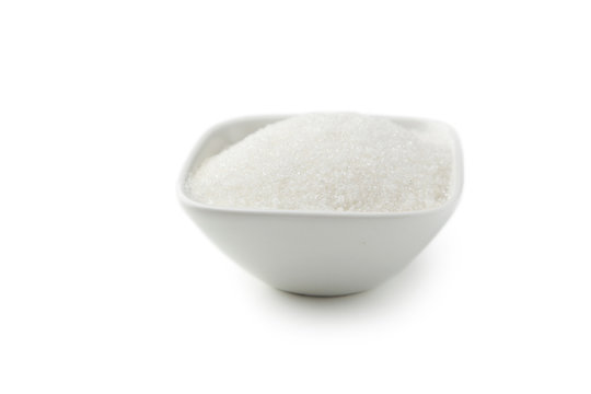 White Sugar In Bowl Isolated On White