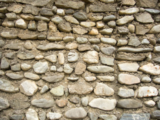 old wall made by river stone