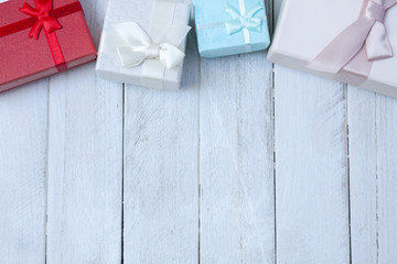 Christmas gift boxes on wooden table