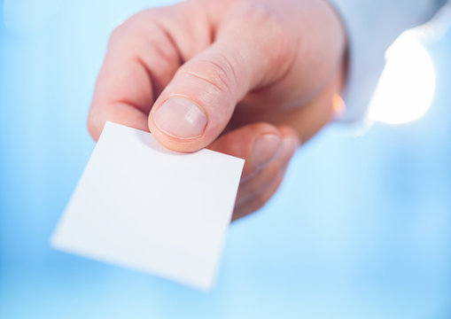 Man's Hand Reaching Out A Business Card