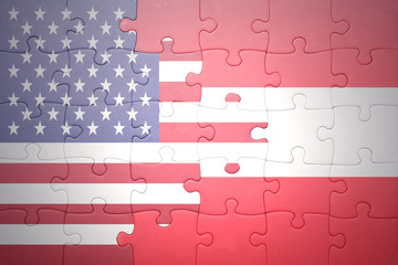 puzzle with the national flag of united states of america and austria
