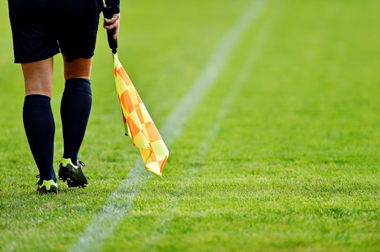 Assistant referee on soccer field