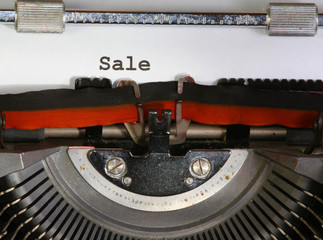 sale written with ink with the typewriter