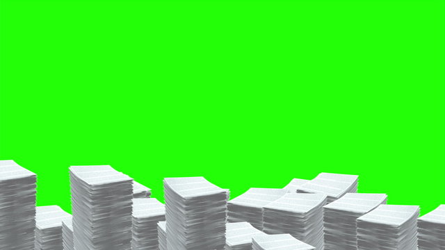 Stacks of Paper Pile Up. Stacks of paper pile up and fill bottom half of screen. On green backdrop.Clip comes with Luma Matte for isolation

