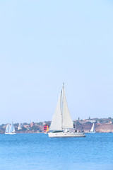 Fototapeta premium Sailing yacht on river