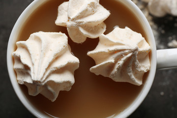 Cup of coffee with kisses closeup, top view