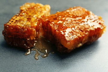 Honeycombs on gray background