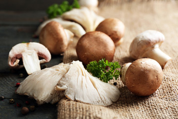 Mushrooms on sackcloth background