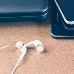 Earphone and Laptop.