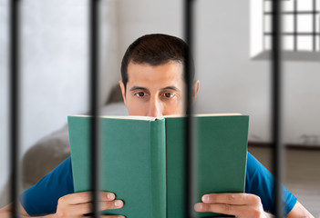 convict reading a book