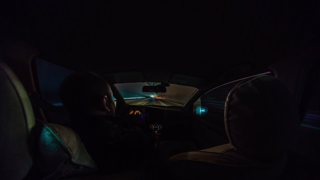 Timelapse of driving at night with camera in car