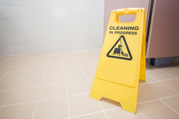 cleaning progress caution sign in toilet