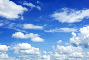 blue sky background with tiny clouds