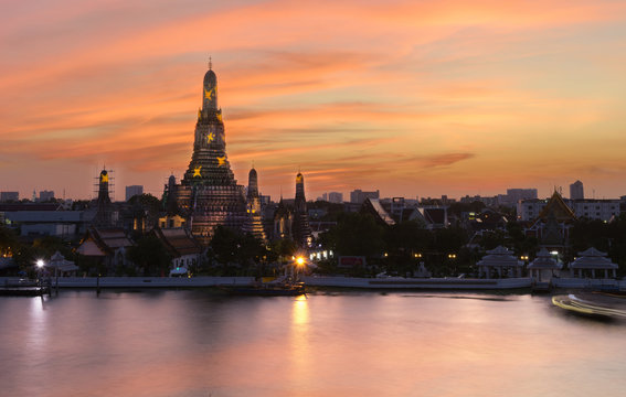 Wat Arun Twilight reflection pool in Bangkok Thailand.