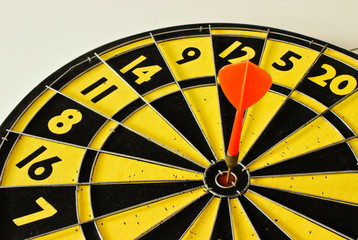 The Dartboard with the Red Dart
