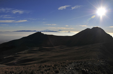 High altitude alpine view from Nevado de Toluca with low clouds in the Trans-Mexican volcanic belt, Mexico