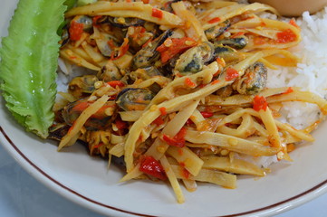 spicy stir-fried bamboo shoot with mussel on rice