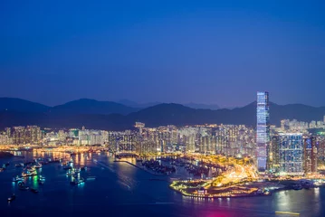Foto op Plexiglas skyscraper of kowloon City Hong kong at Twilight view from The Peak. © chalit555