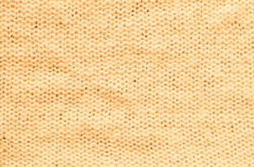 Closeup wrinkled orange coat fabric background