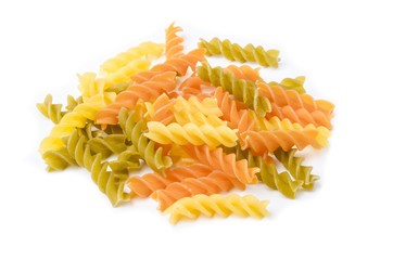 Uncooked italian pasta - three colors spirals.