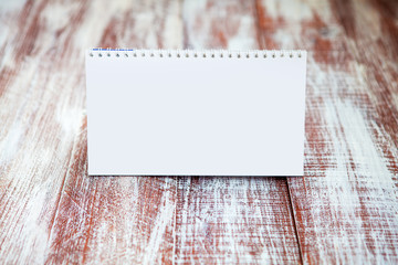calendar 2016 isolated on a wooden background
