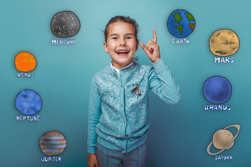 Teen girl shows up finger glad happy laughing planets of the sol