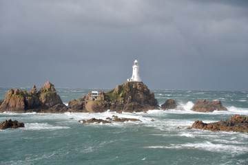 Corbiere lighthouse in storm on Jersey