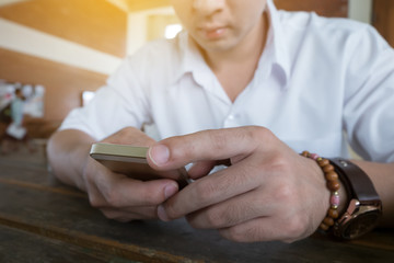 Obraz na płótnie Canvas businessman using a mobile phone with texting message