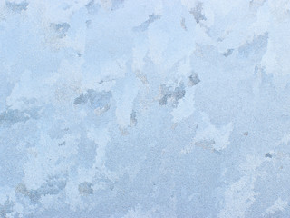 Frosty natural pattern on winter window.